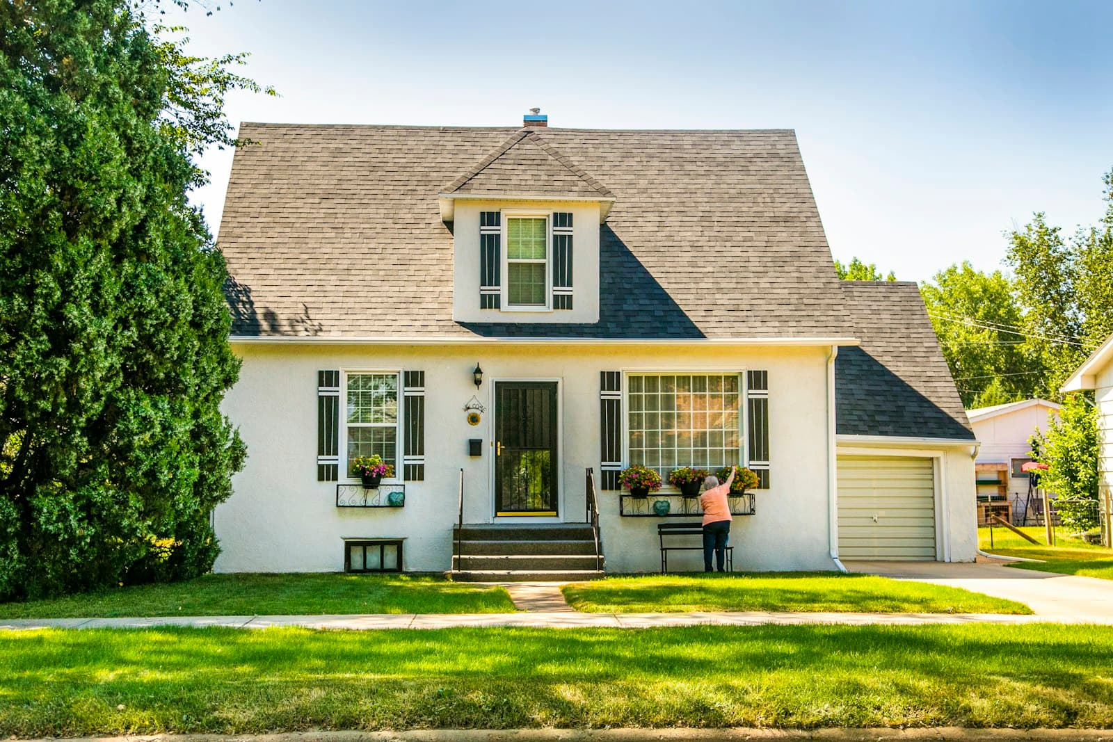 Freshly maintained residential lawn in front of a home